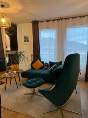 Warm apartment + private free park.